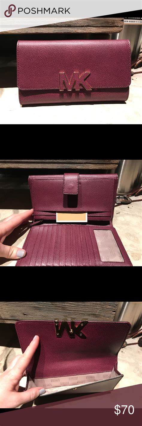 michael kors wallet maroon.